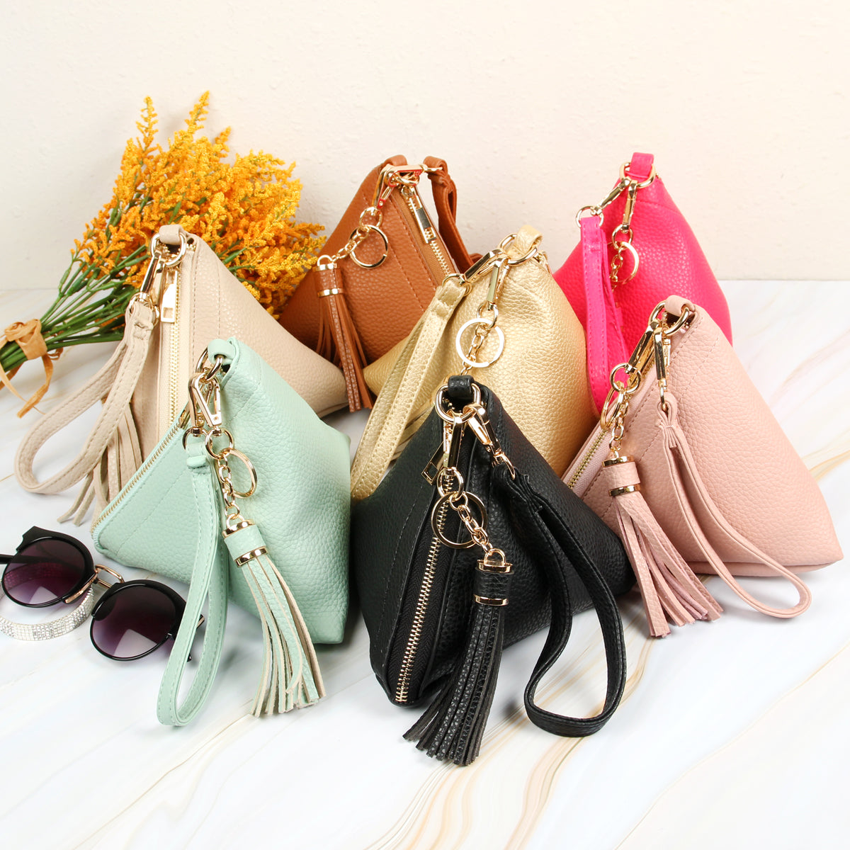 Pyramid Shape Tassel Wristlet Leather Bag