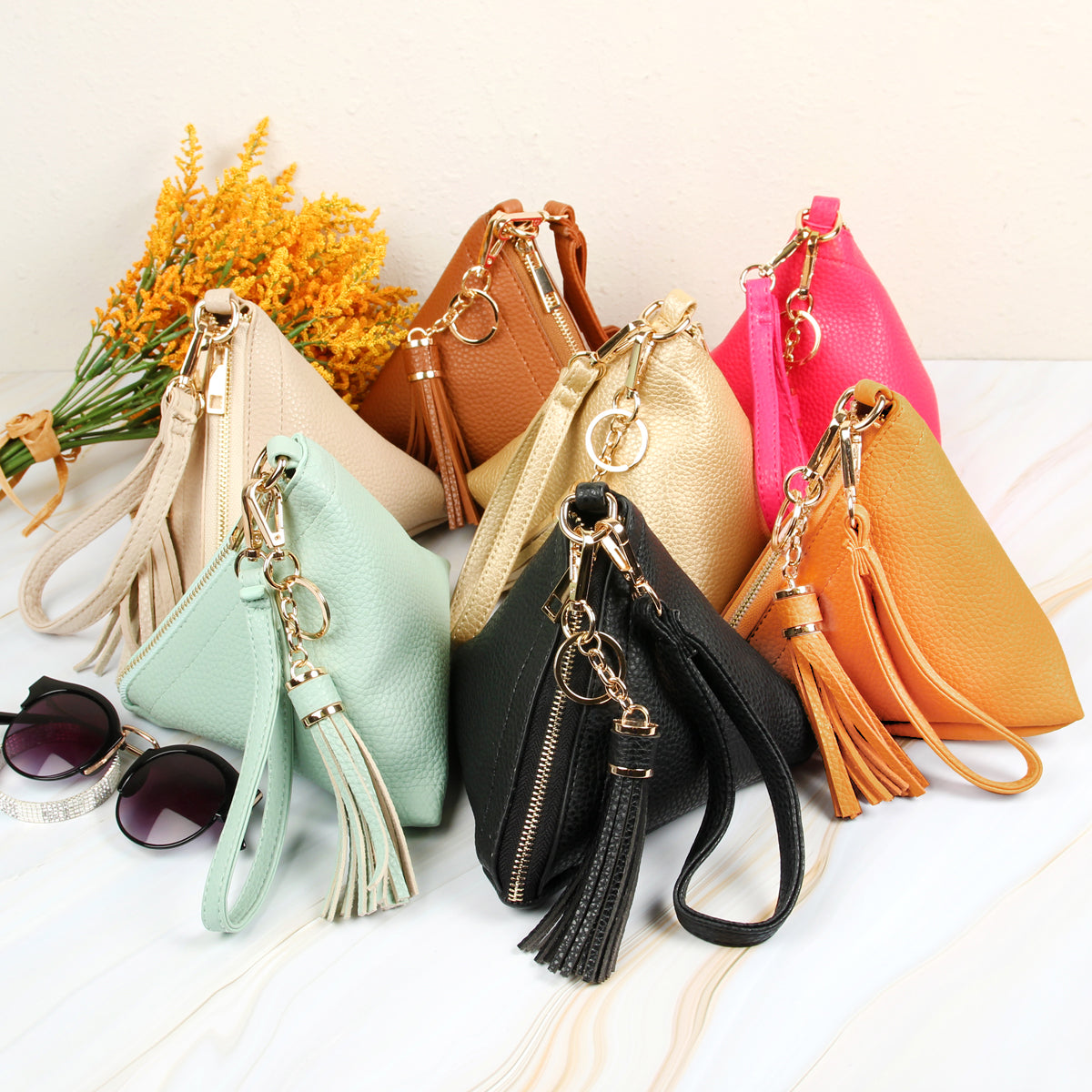 Pyramid Shape Tassel Wristlet Leather Bag