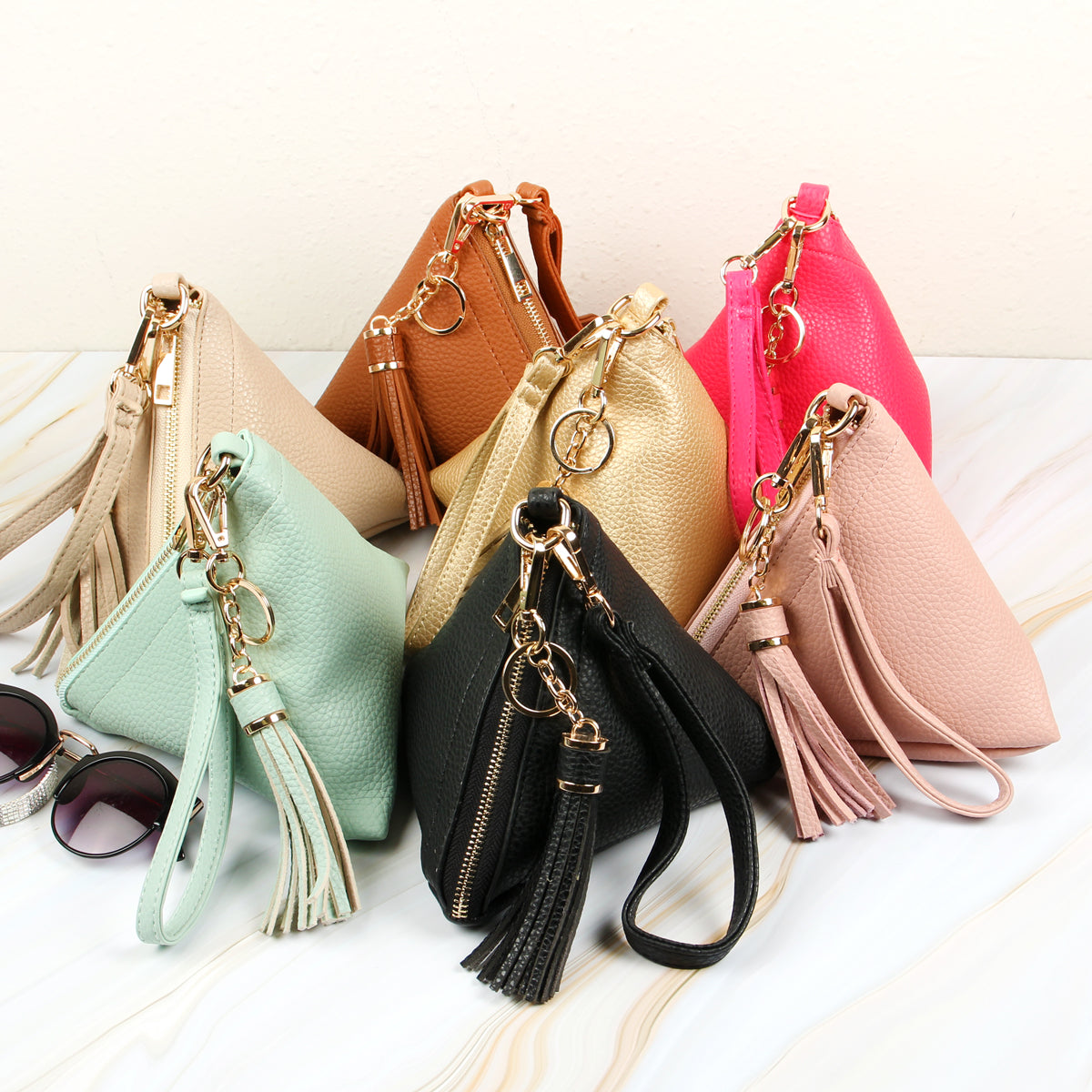 Pyramid Shape Tassel Wristlet Leather Bag