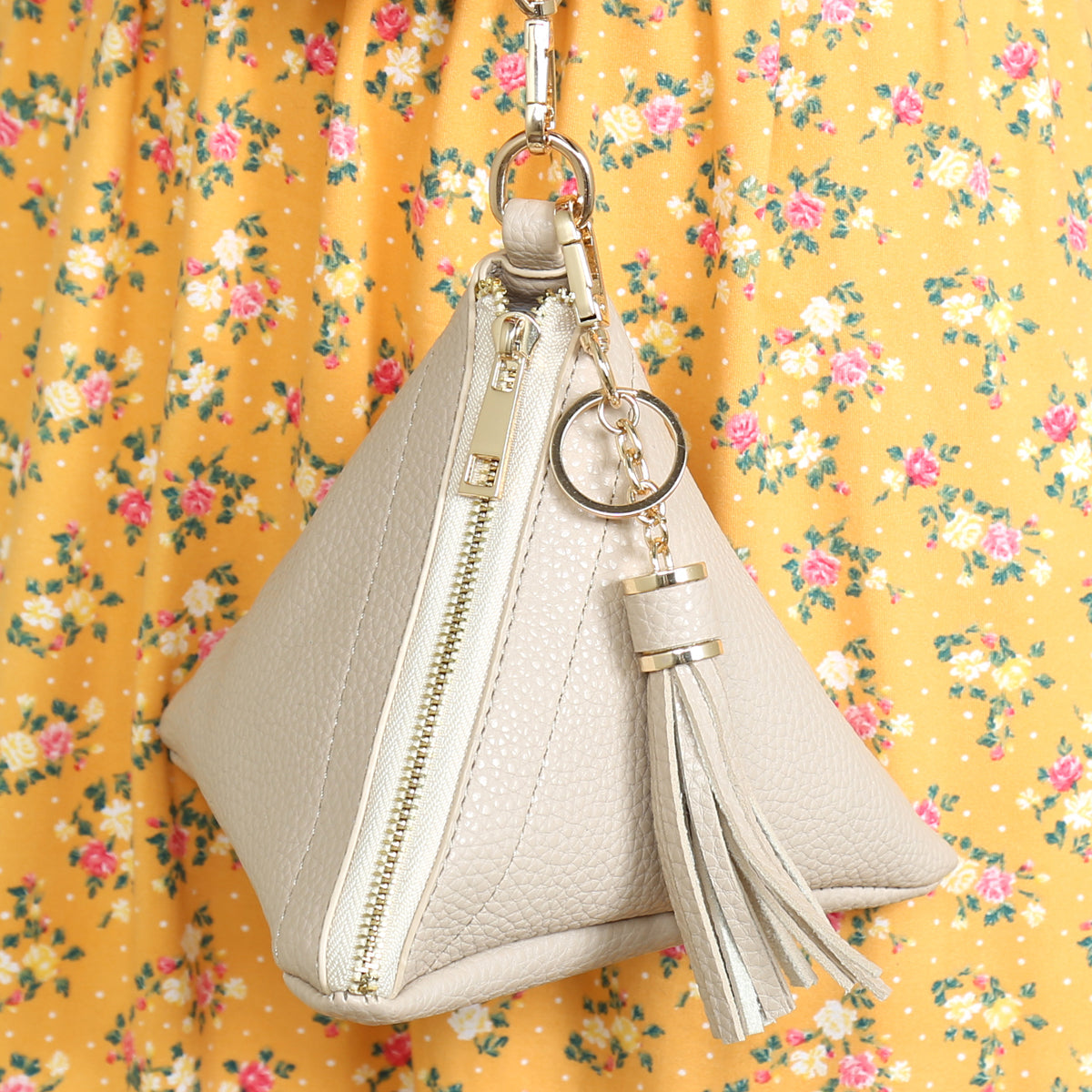 Pyramid Shape Tassel Wristlet Leather Bag