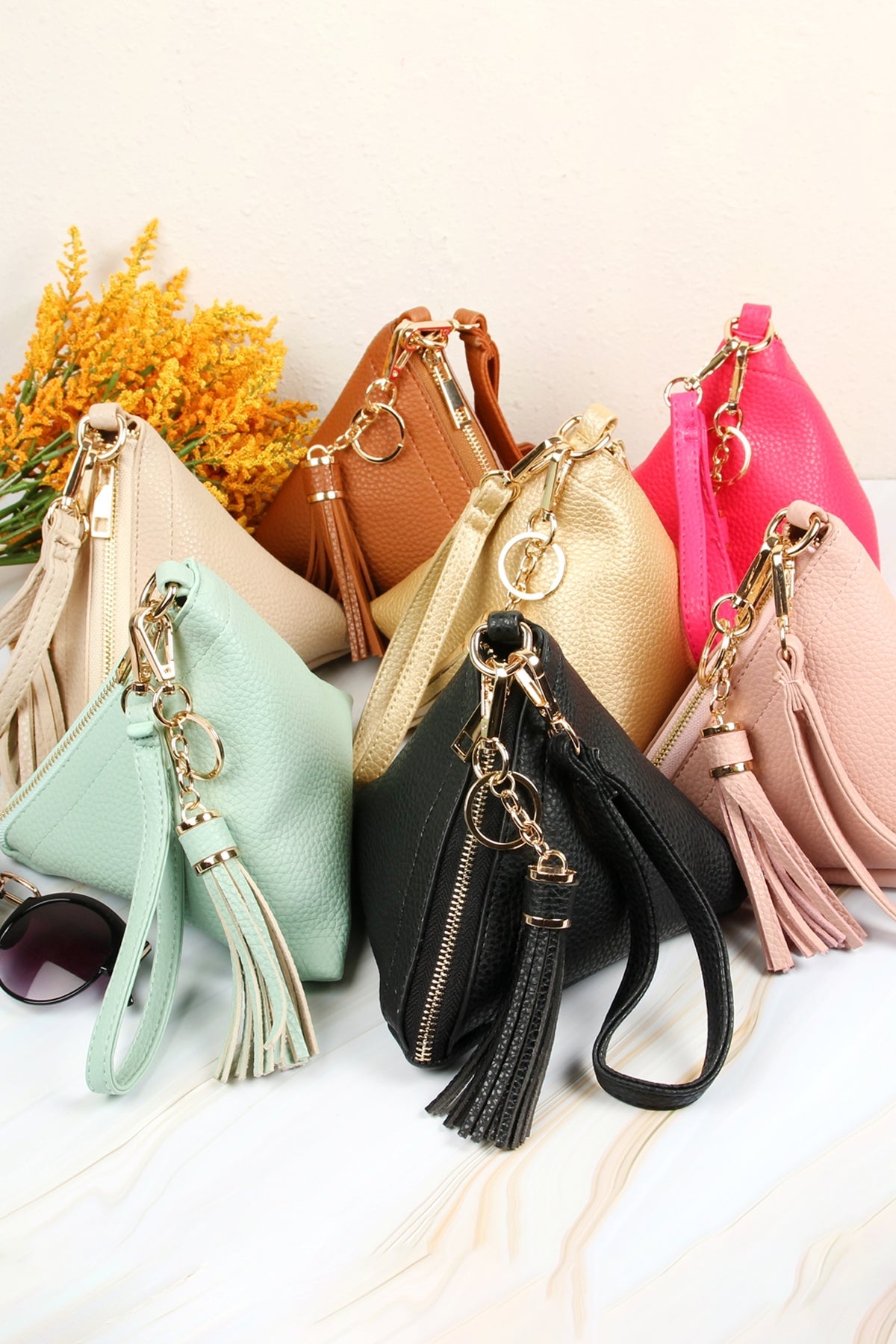 Pyramid Shape Tassel Wristlet Leather Bag